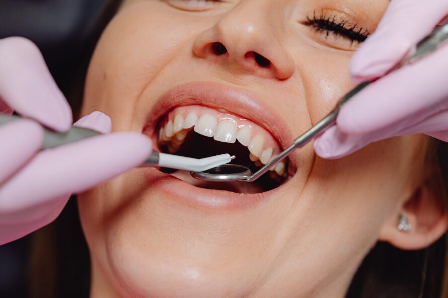 woman during dental checkup on tissue grafts