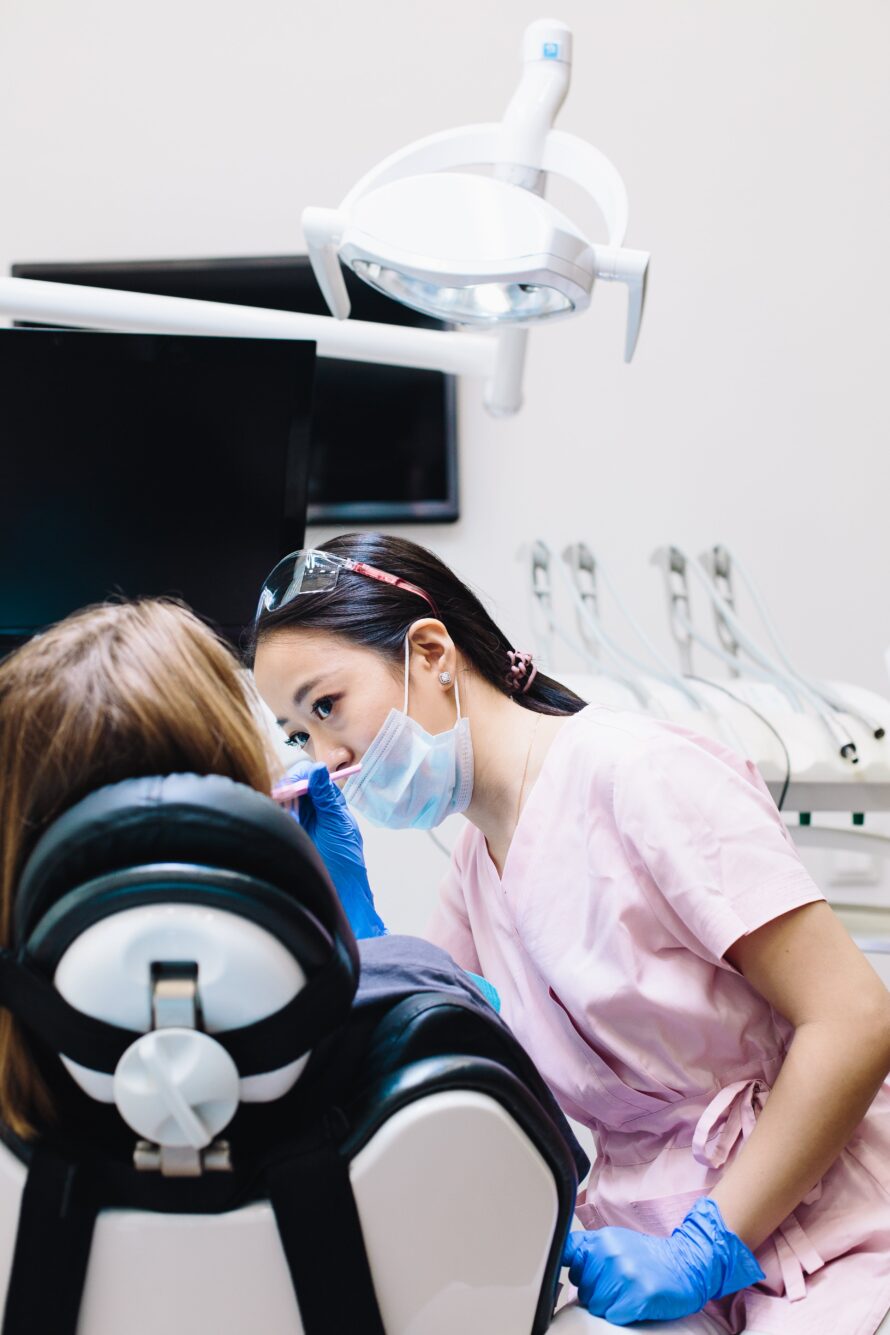 patient in dental clinic being inspected for a root canal procedure